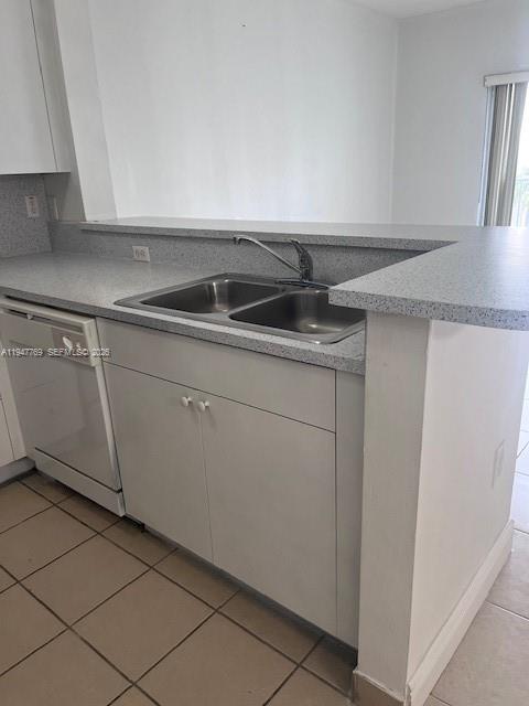 11060 Southwest 196th Street, Unit 313 Cutler Bay, FL 33157 - Photo 4 of 18 a kitchen with a sink and cabinets