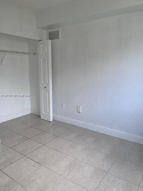 11060 Southwest 196th Street, Unit 313 Cutler Bay, FL 33157 - Photo 10 of 18 a view of an empty room