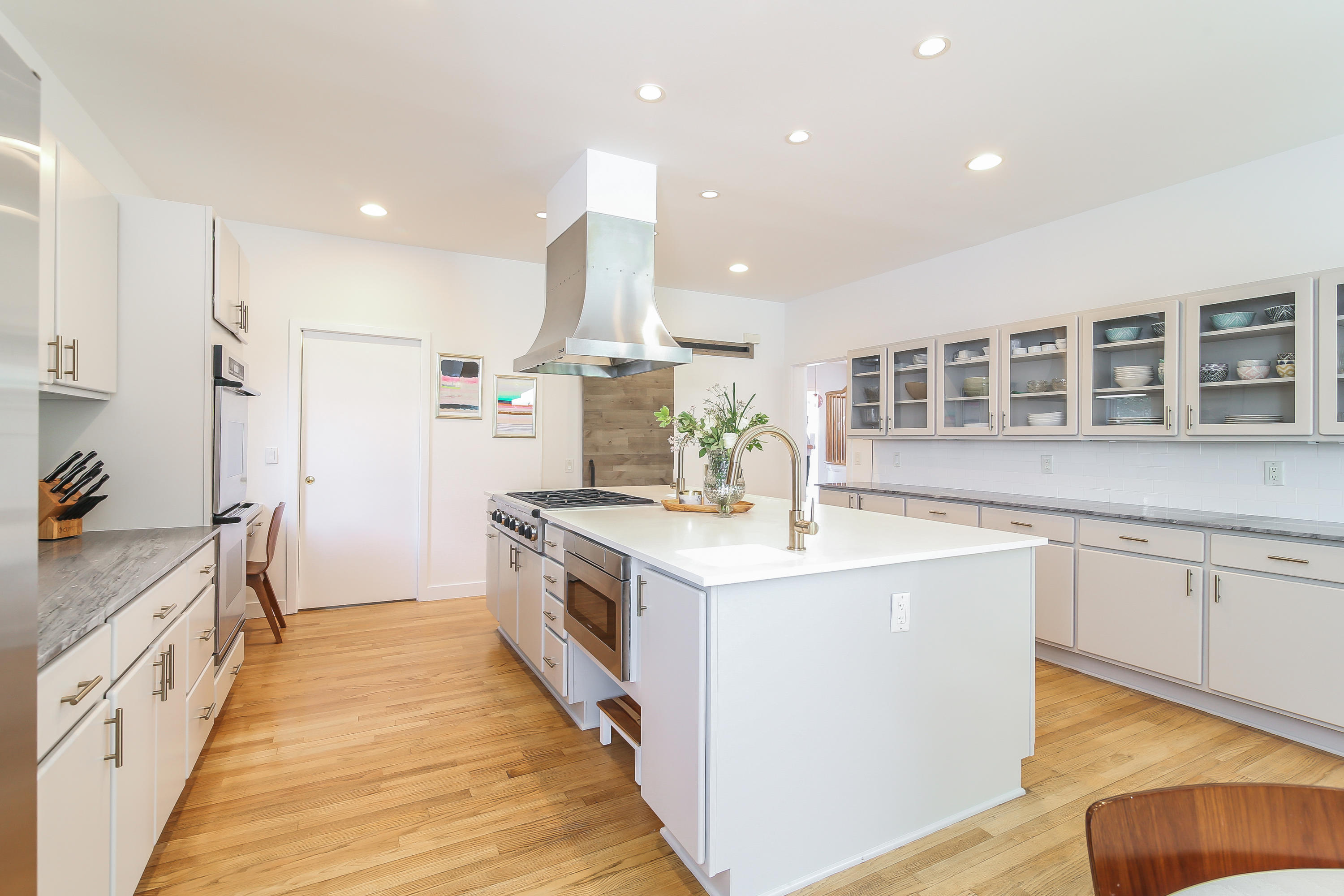 15 Marshall Ridge Road New Canaan, CT 06840 - Photo 11 of 30 a kitchen with stainless steel appliances granite countertop a stove and a sink