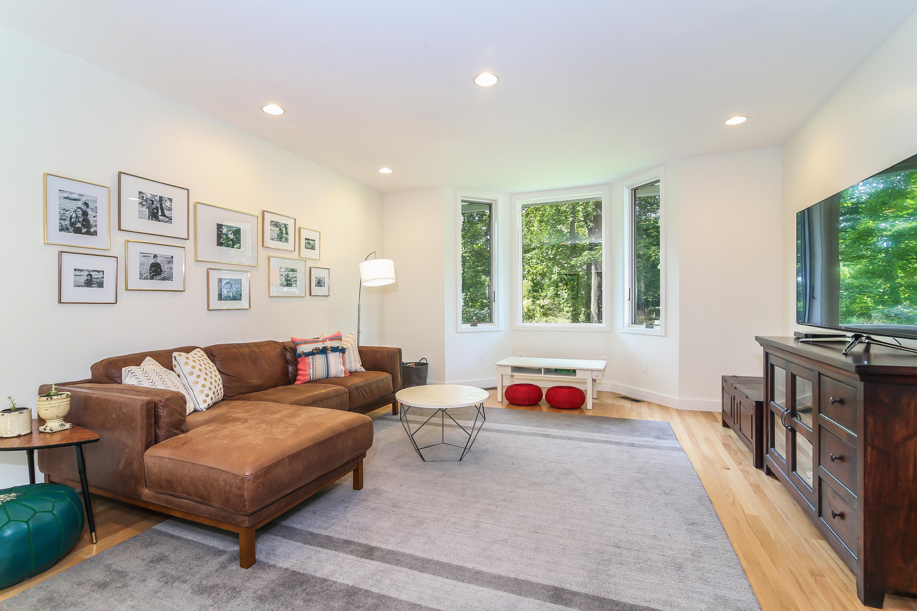 15 Marshall Ridge Road New Canaan, CT 06840 - Photo 14 of 30 a living room with furniture and a flat screen tv