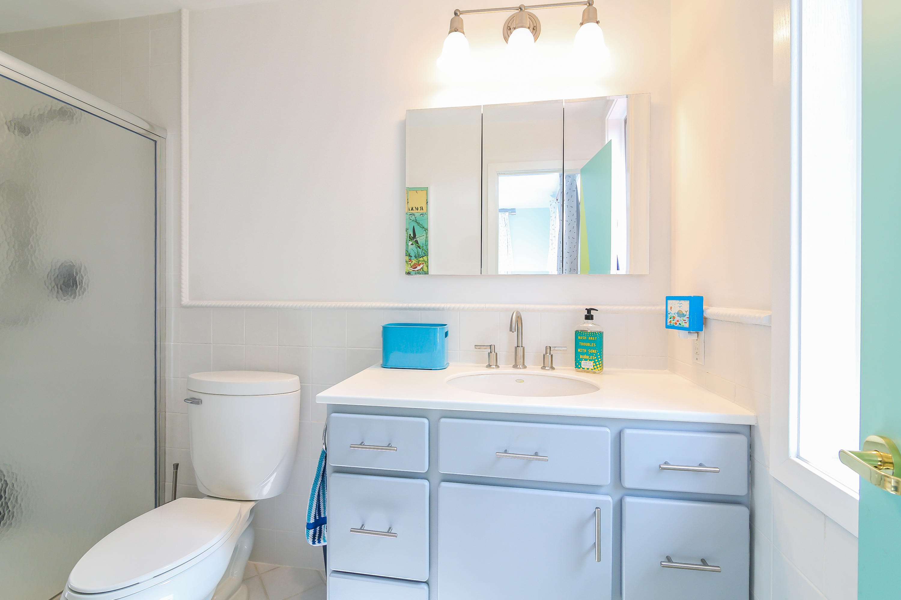 15 Marshall Ridge Road New Canaan, CT 06840 - Photo 17 of 30 a bathroom with a sink a toilet and a mirror