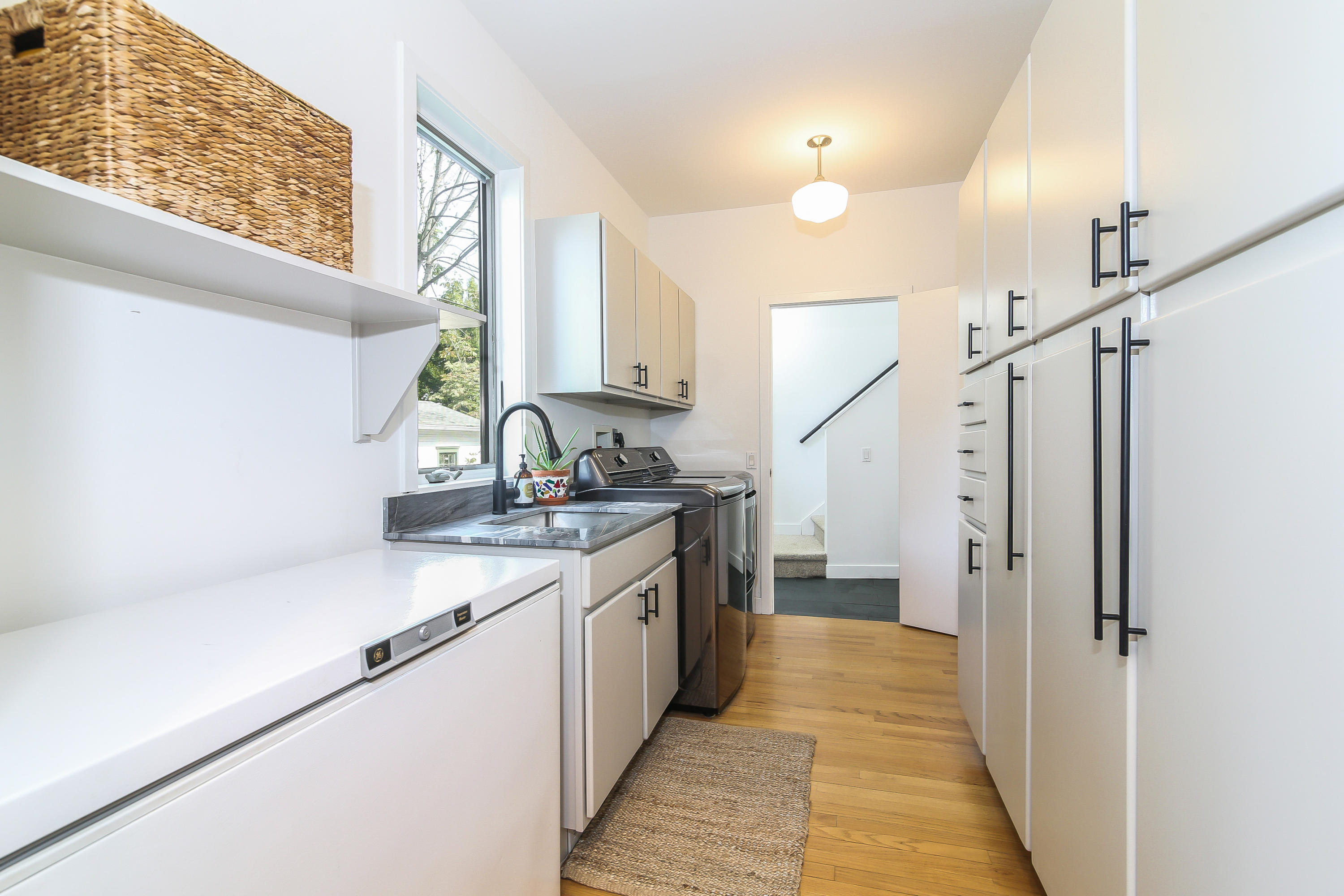 15 Marshall Ridge Road New Canaan, CT 06840 - Photo 23 of 30 a kitchen with a sink a counter top space and cabinets