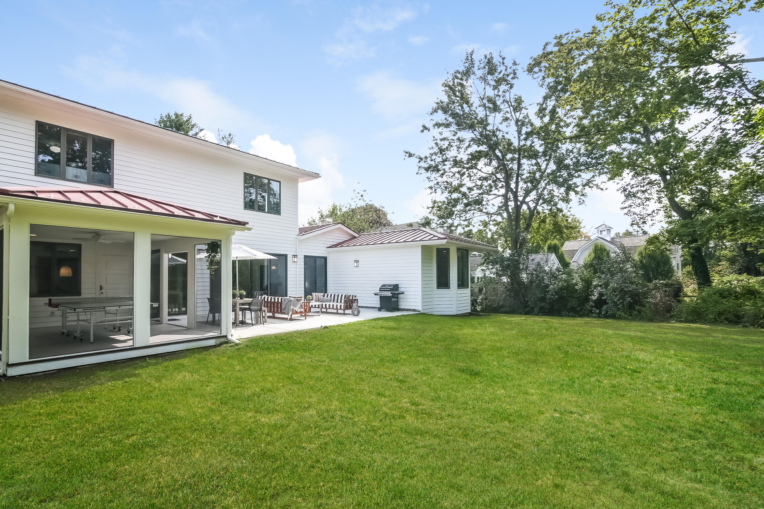 15 Marshall Ridge Road New Canaan, CT 06840 - Photo 29 of 30 a view of a house with a yard and sitting area