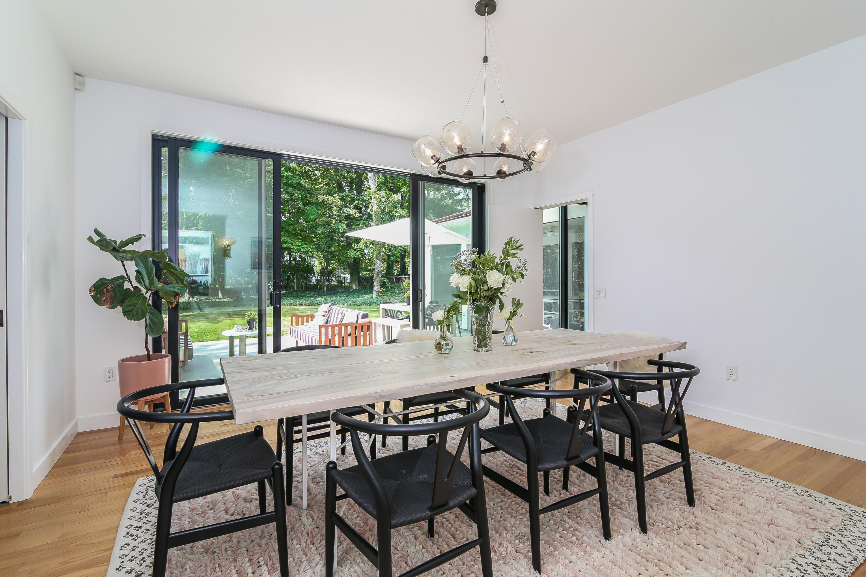 15 Marshall Ridge Road New Canaan, CT 06840 - Photo 6 of 30 a view of a dining room with furniture window and wooden floor