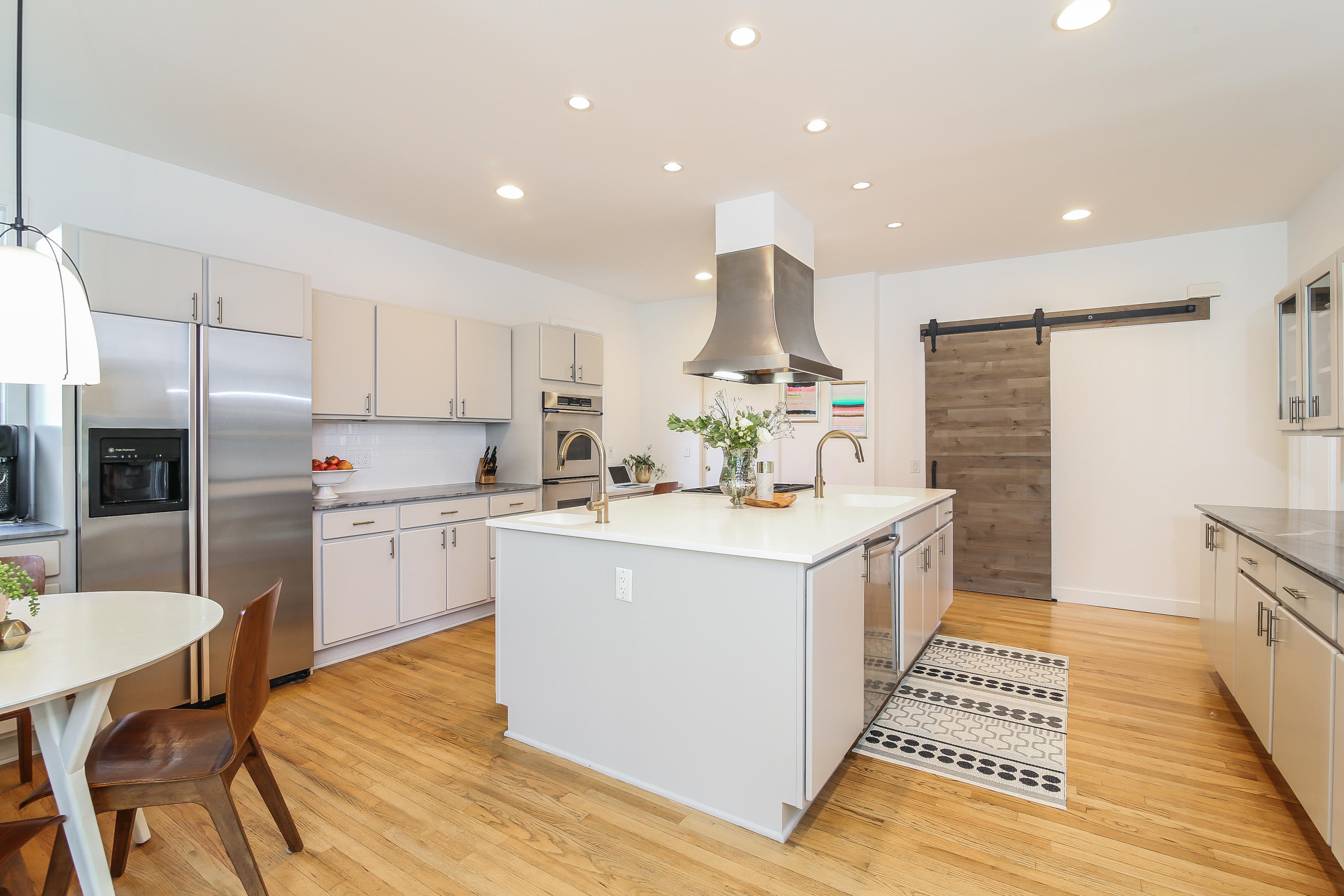 15 Marshall Ridge Road New Canaan, CT 06840 - Photo 10 of 30 a kitchen with a sink appliances and cabinets