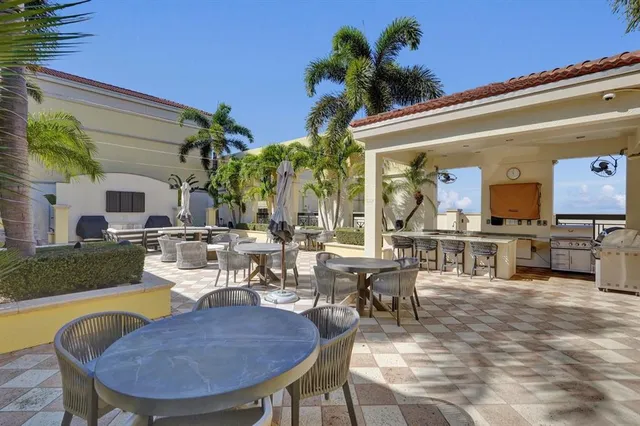 a view of a dining room and livingroom with furniture