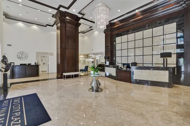 a view of a living room and bathroom