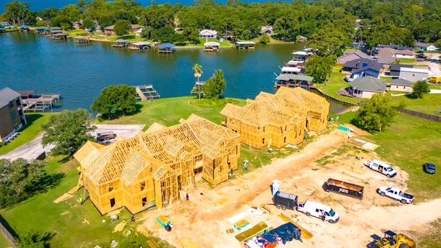 an aerial view of lake residential house with outdoor space