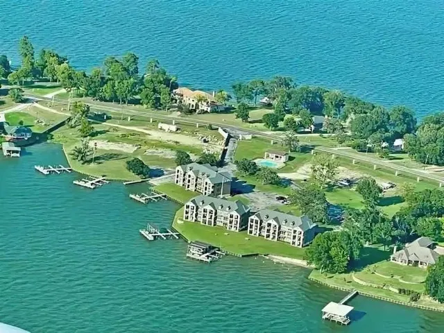 a view of a lake with a big yard