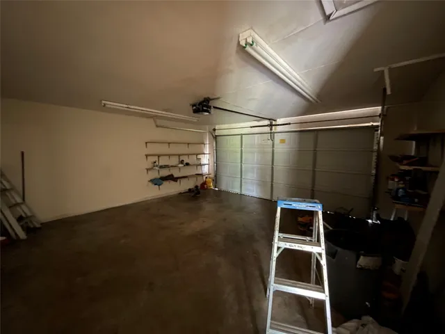 a view of a backyard with a garden