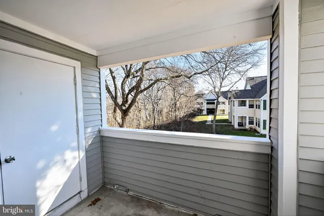 a view of a house with a tree