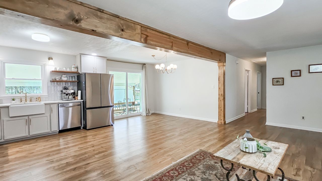 20 Tunstill Loop Road Fayetteville, TN 37334 - Photo 11 of 48 a kitchen with stainless steel appliances a refrigerator and wooden floor