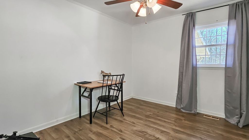 20 Tunstill Loop Road Fayetteville, TN 37334 - Photo 19 of 48 a workspace room with furniture and wooden floor