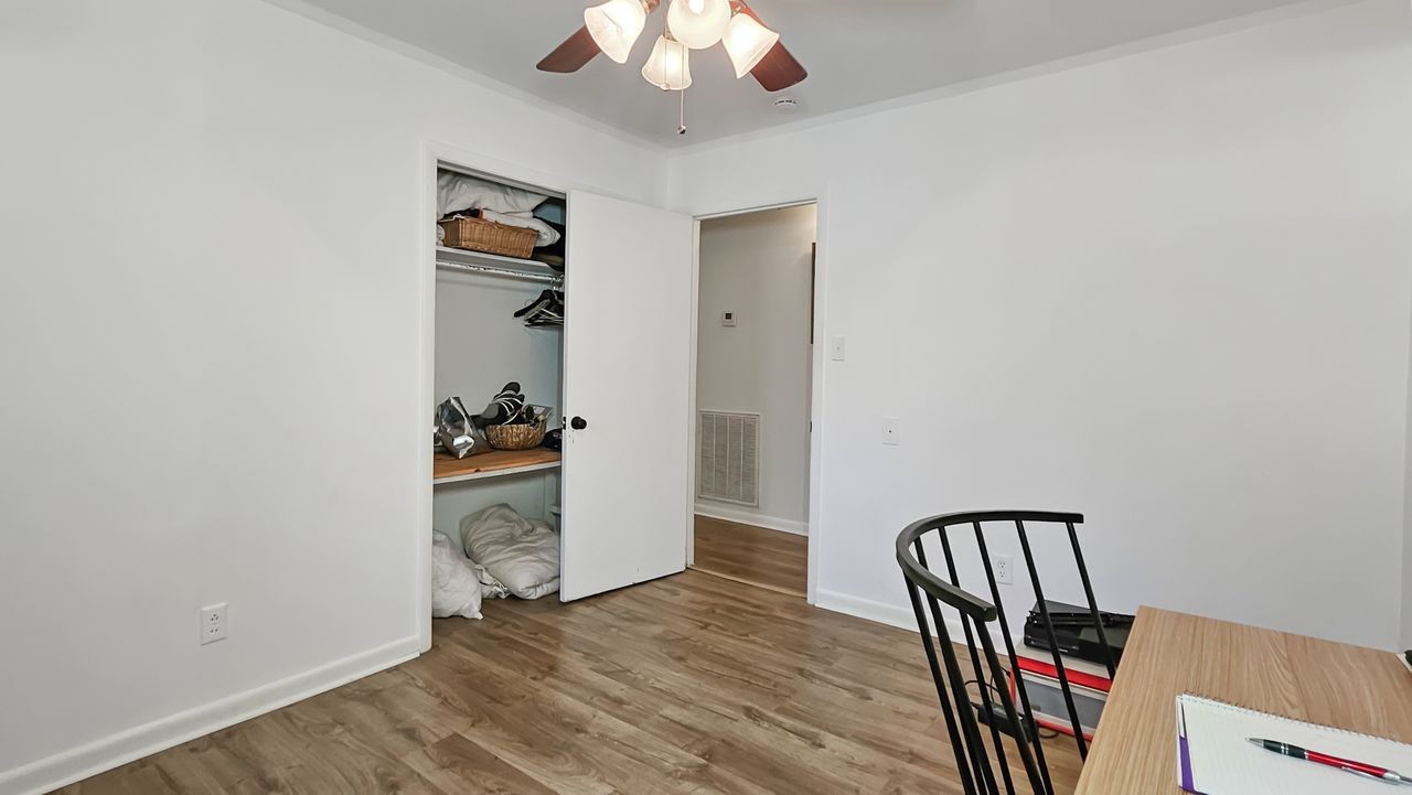 20 Tunstill Loop Road Fayetteville, TN 37334 - Photo 20 of 48 a view of a hallway view with wooden floor and staircase