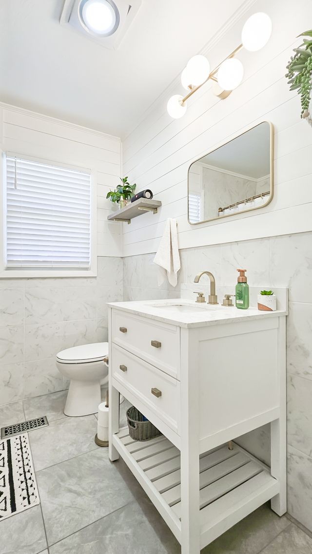 20 Tunstill Loop Road Fayetteville, TN 37334 - Photo 21 of 48 a bathroom with a sink a toilet and a mirror