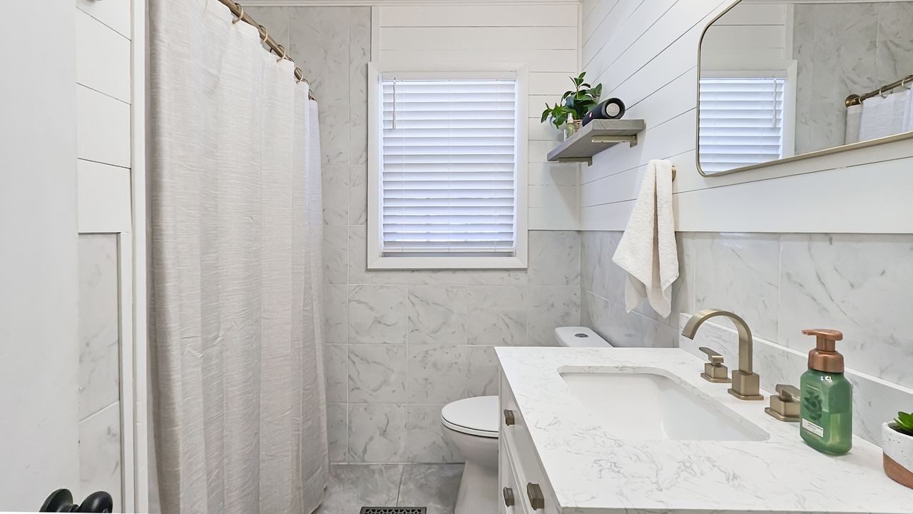 20 Tunstill Loop Road Fayetteville, TN 37334 - Photo 22 of 48 a bathroom with a sink toilet and shower