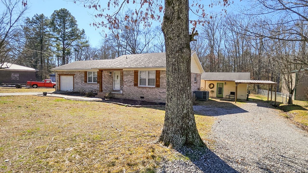 20 Tunstill Loop Road Fayetteville, TN 37334 - Photo 28 of 48 a view of a house with snow on the road
