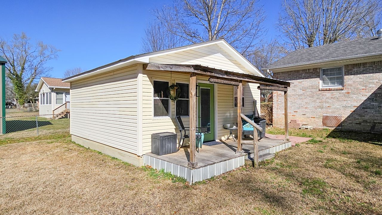 20 Tunstill Loop Road Fayetteville, TN 37334 - Photo 32 of 48 a view of a house with backyard and sitting area