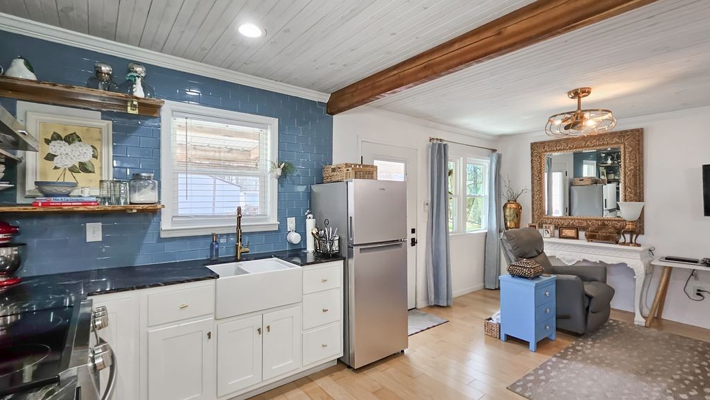 20 Tunstill Loop Road Fayetteville, TN 37334 - Photo 35 of 48 a kitchen with a sink stove and refrigerator