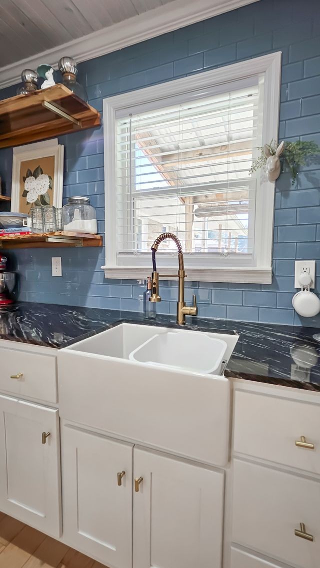 20 Tunstill Loop Road Fayetteville, TN 37334 - Photo 36 of 48 a kitchen with granite countertop a sink and a stove