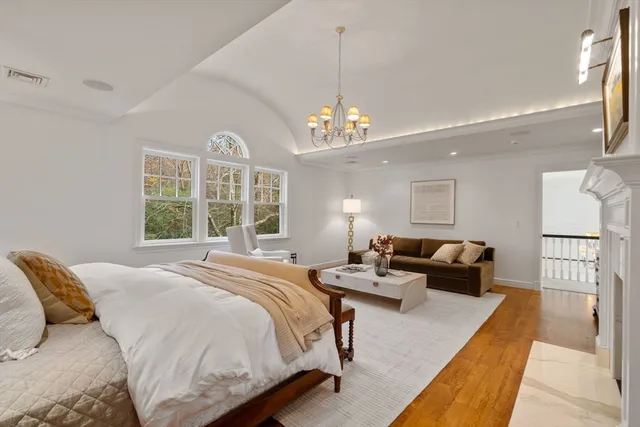 a bathroom with a shower a sink and a mirror