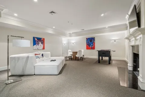 a view of a street with trees on both side of it