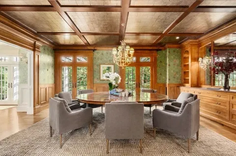 a dining room with large window