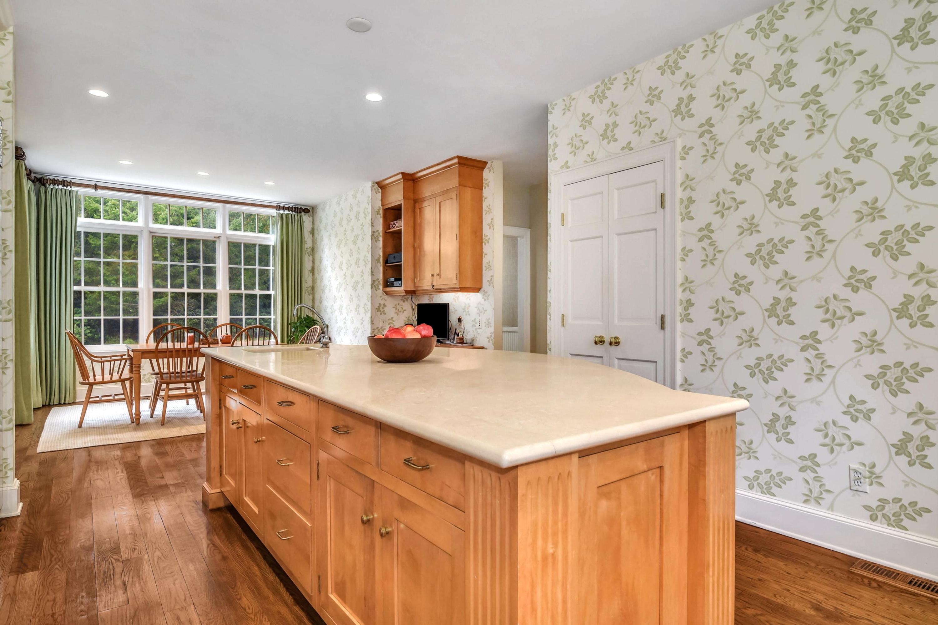 104 Christie Hill Road Darien, CT 06820 - Photo 11 of 38 a kitchen with stainless steel appliances a cabinets and wooden floor