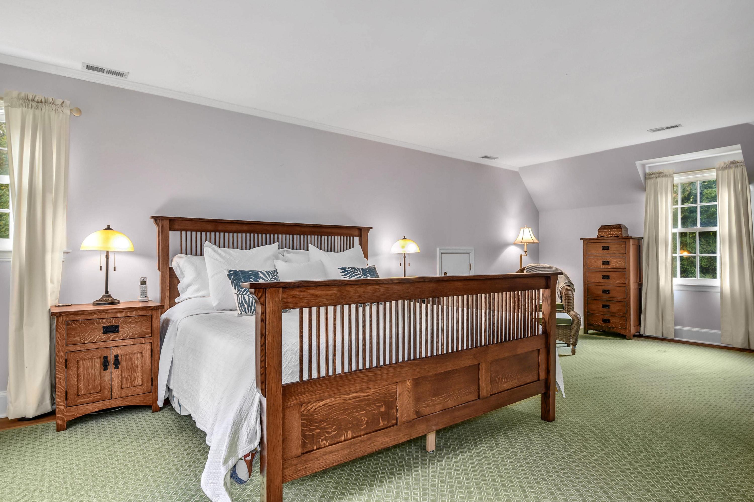 104 Christie Hill Road Darien, CT 06820 - Photo 18 of 38 a bedroom with a bed and a night stand