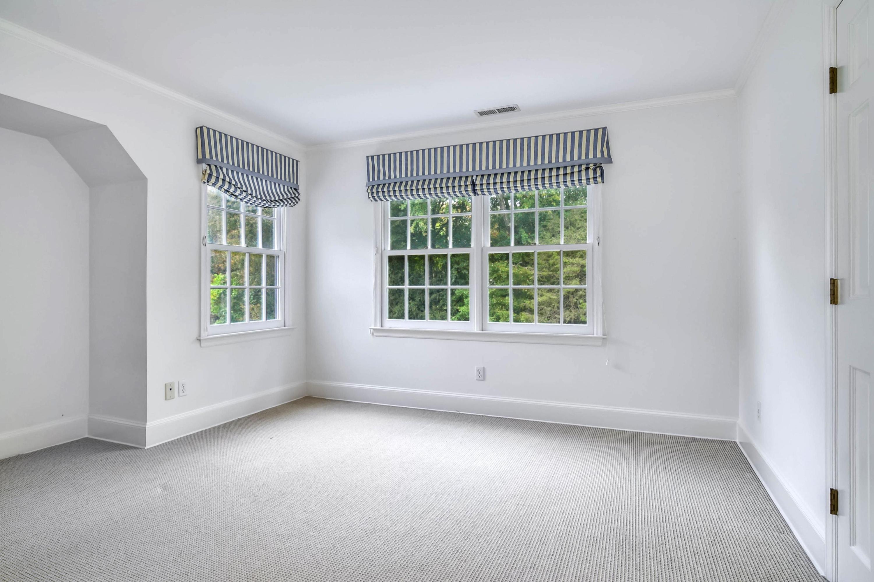 104 Christie Hill Road Darien, CT 06820 - Photo 26 of 38 an empty room with windows