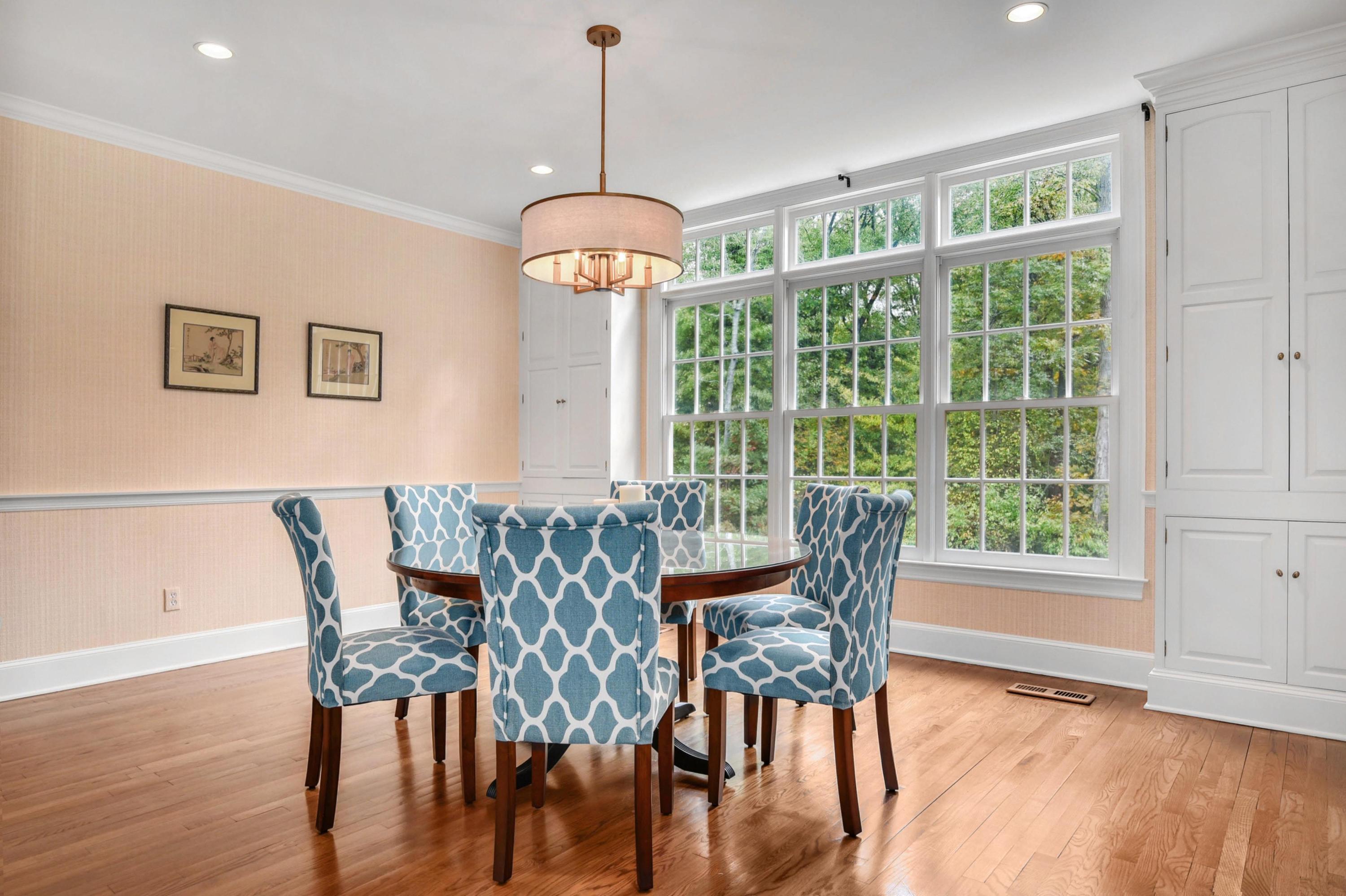 104 Christie Hill Road Darien, CT 06820 - Photo 5 of 38 a view of a dining room with furniture window and wooden floor