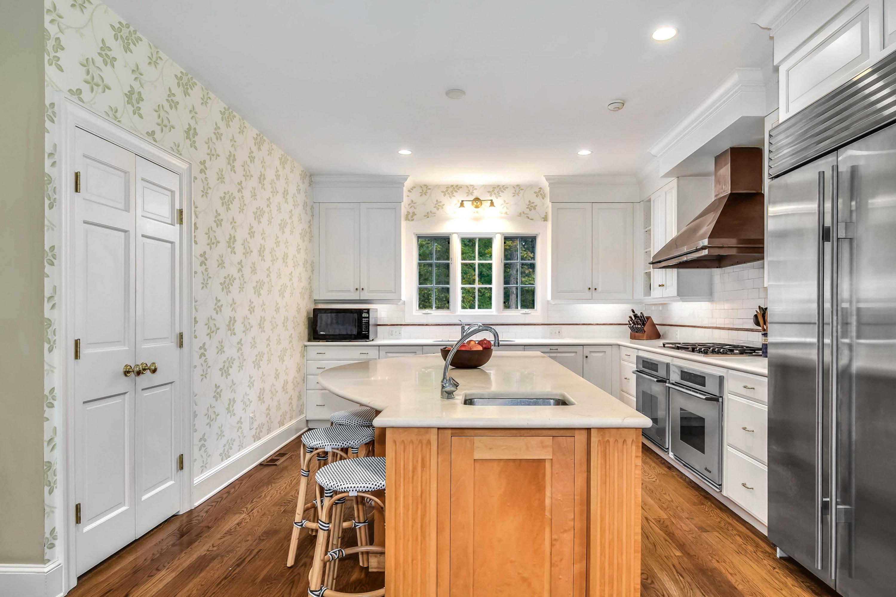 104 Christie Hill Road Darien, CT 06820 - Photo 9 of 38 a kitchen with a sink stove and refrigerator