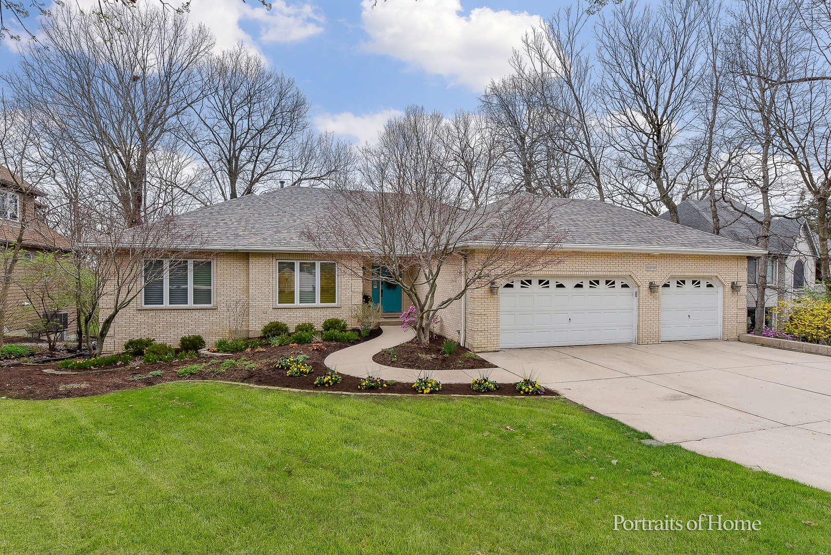 11 Merrimack Court Bolingbrook, IL 60440 - Photo 2 of 46 a front view of a house with garden