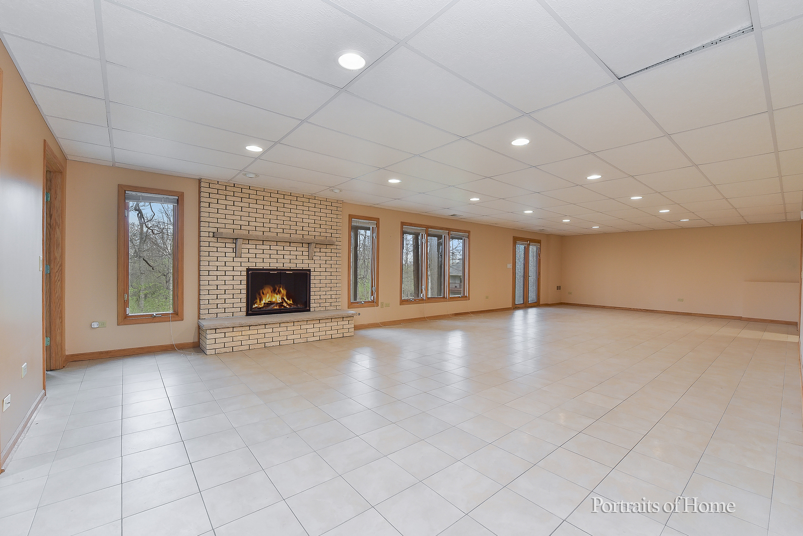11 Merrimack Court Bolingbrook, IL 60440 - Photo 27 of 46 an empty room with windows and fireplace