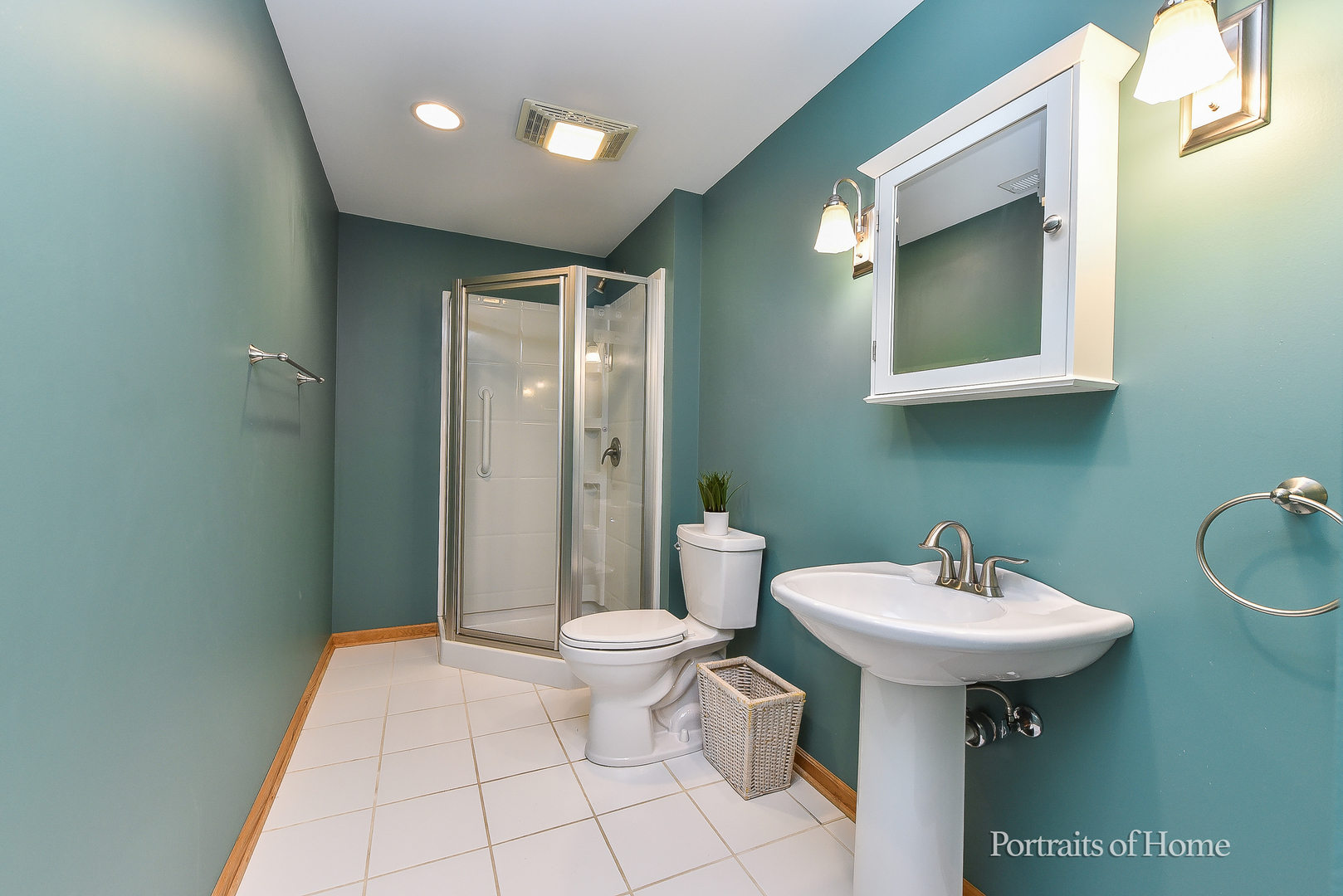 11 Merrimack Court Bolingbrook, IL 60440 - Photo 30 of 46 a bathroom with a sink a toilet and mirror