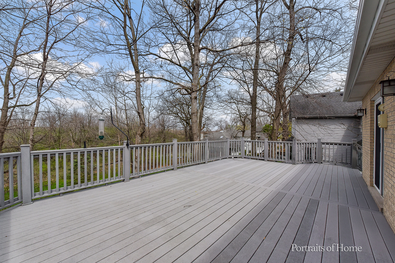 11 Merrimack Court Bolingbrook, IL 60440 - Photo 35 of 46 a view of backyard with wooden floor and fence and trees