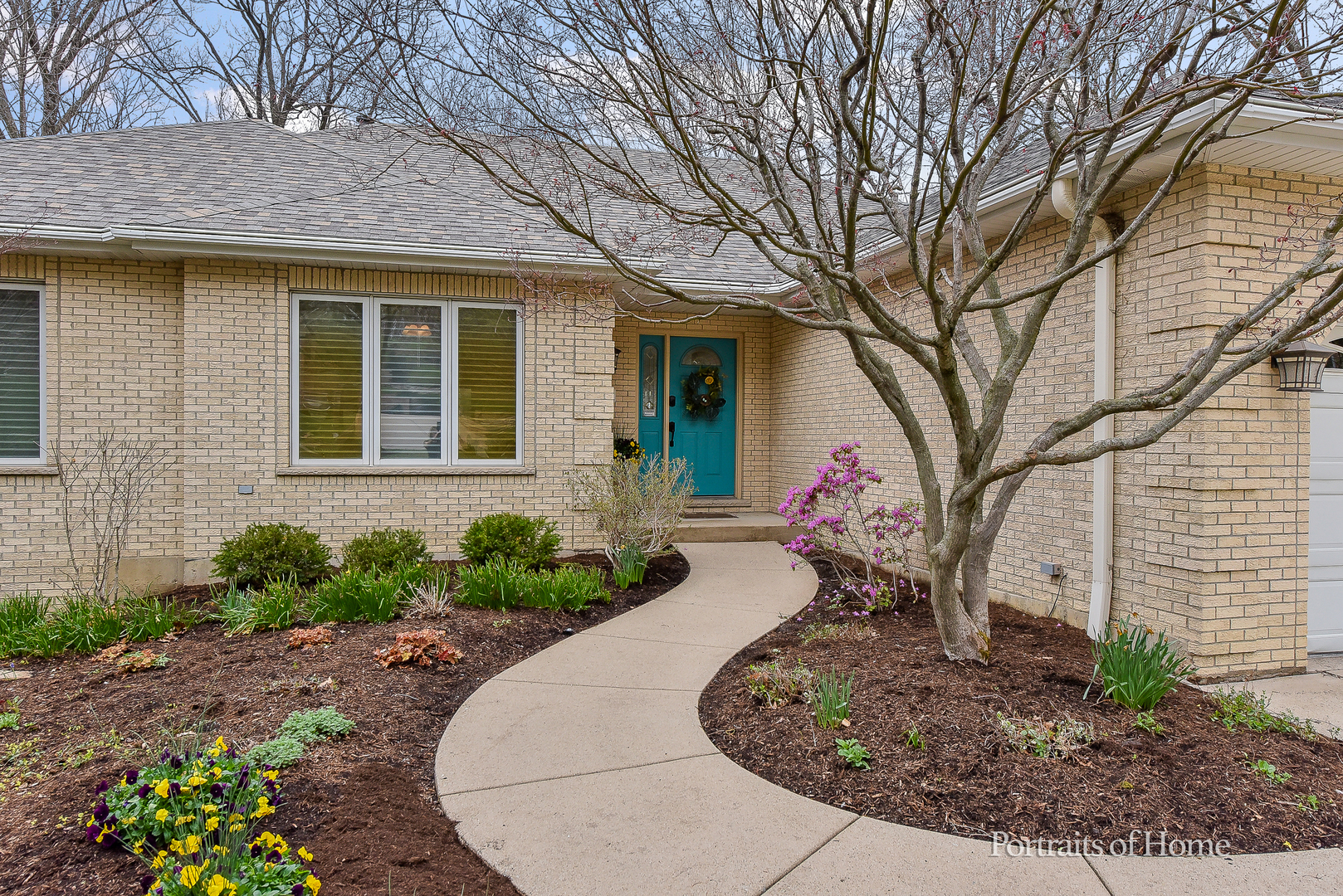 11 Merrimack Court Bolingbrook, IL 60440 - Photo 4 of 46 a front view of a house with garden