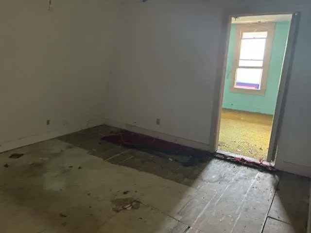 an empty room with a window