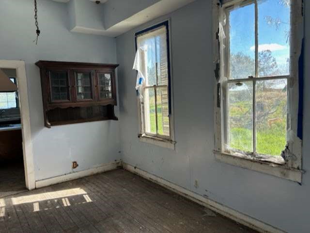1314 Sixth Street Angleton, TX 77515 - Photo 6 of 8 a view of an empty room with a window