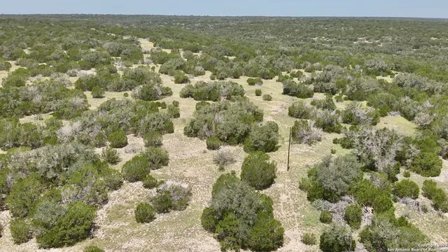 a view of a field with an outdoor space