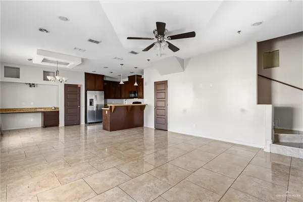 a view of kitchen with furniture and window