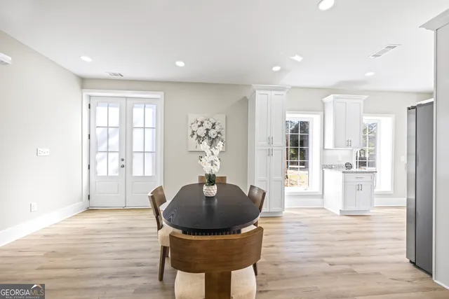 a kitchen with a stove and a microwave