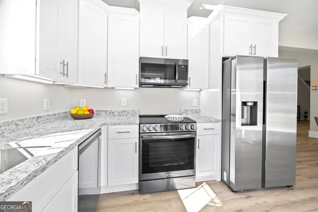 a bed room with a bed and a window