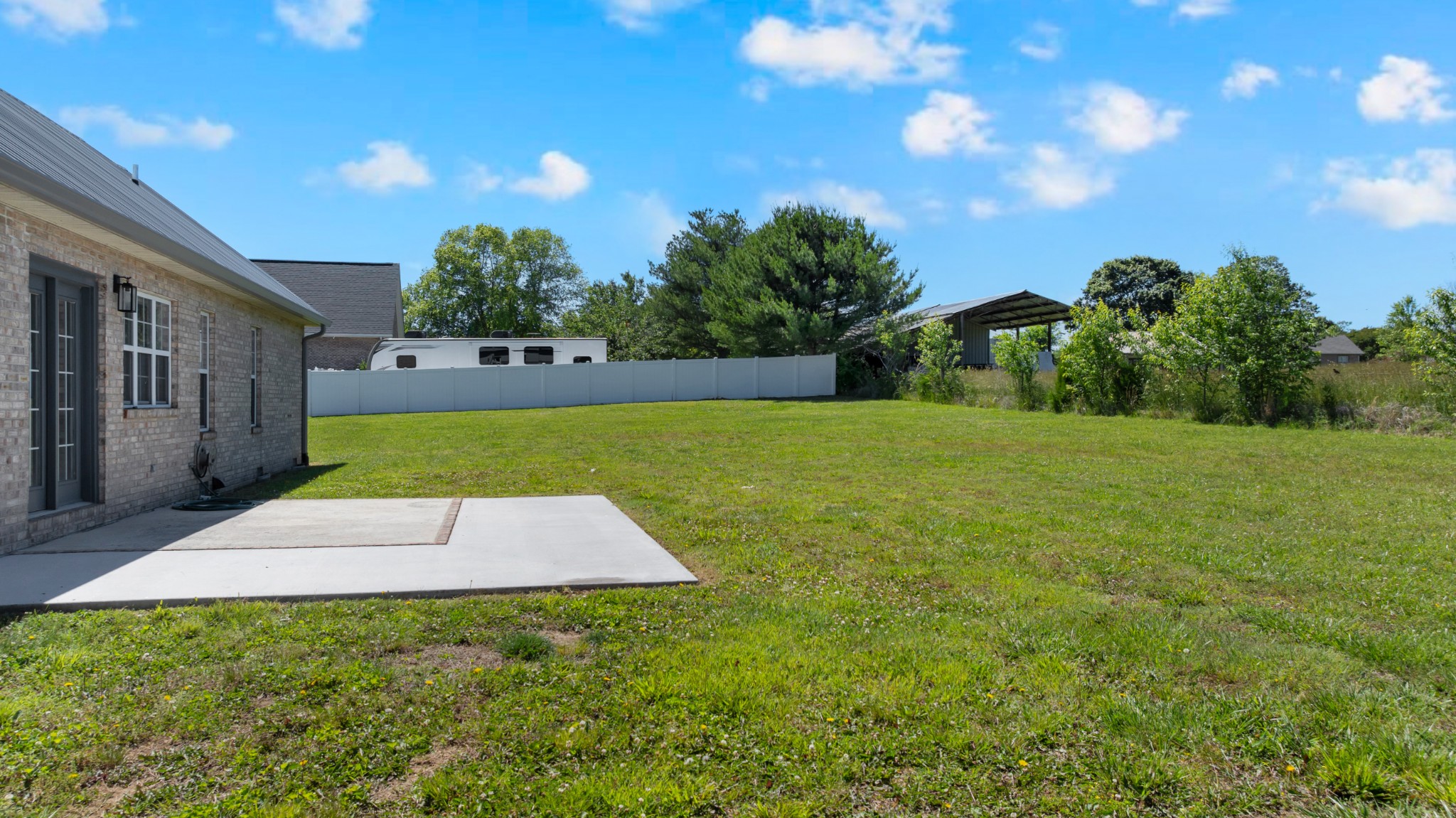 3896 Lynchburg Road Winchester, TN 37398 - Photo 45 of 57 a view of backyard with swimming pool and outdoor seating