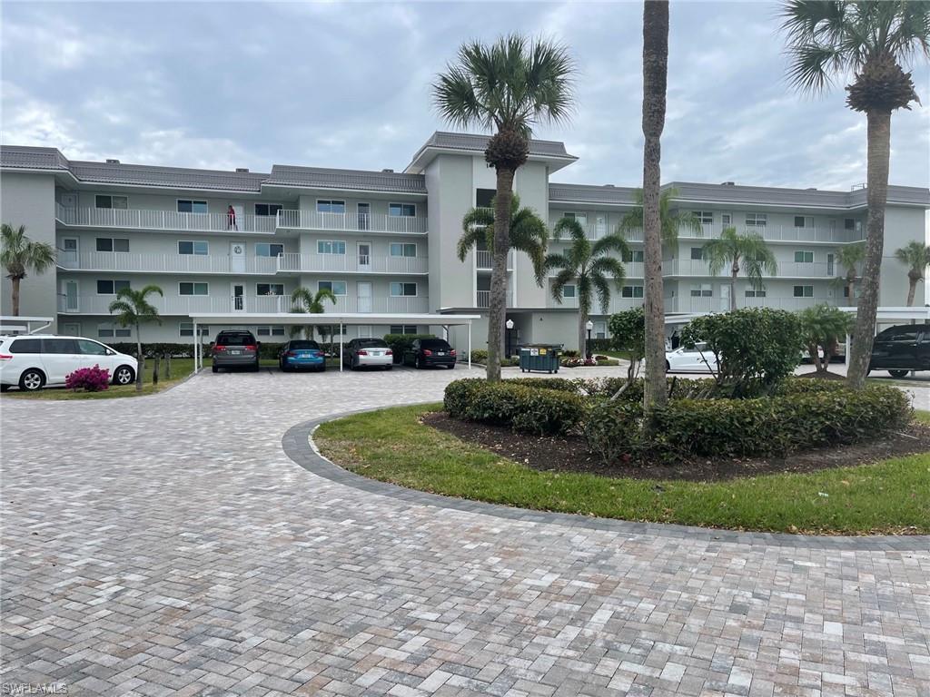 a cars parked in front of a building