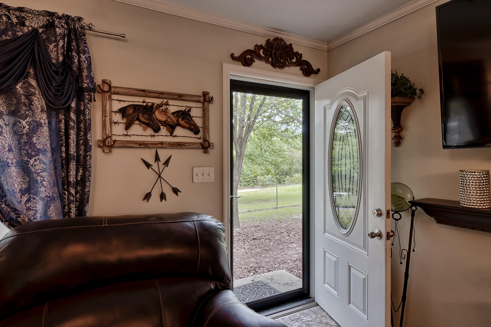550 Shadow Lane Road Wagener, SC 29164 - Photo 3 of 23 a room with furniture and a flat screen tv