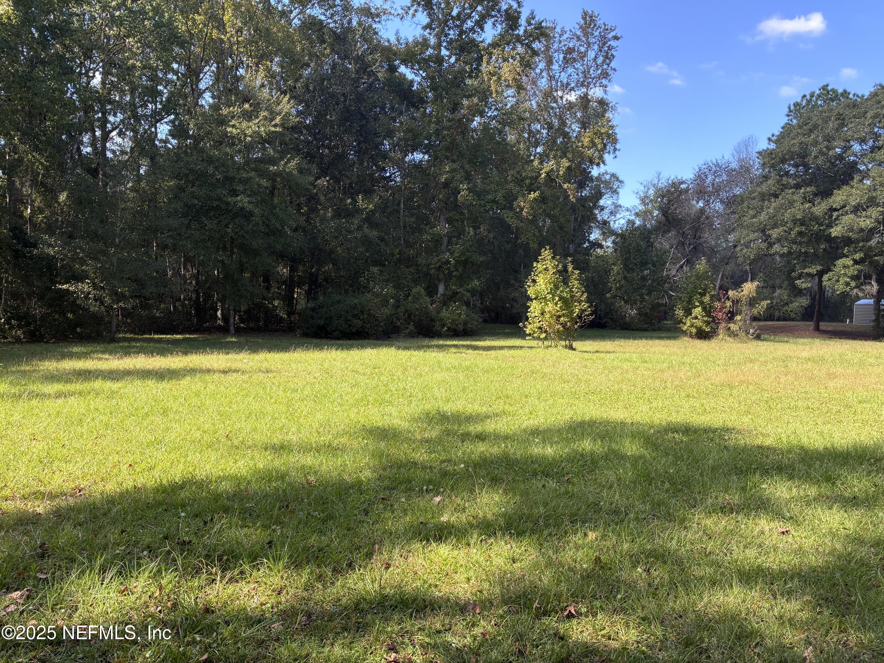 0 Korey's Lane Callahan, FL 32011 - Photo 6 of 12 a view of swimming pool with an outdoor space and seating area