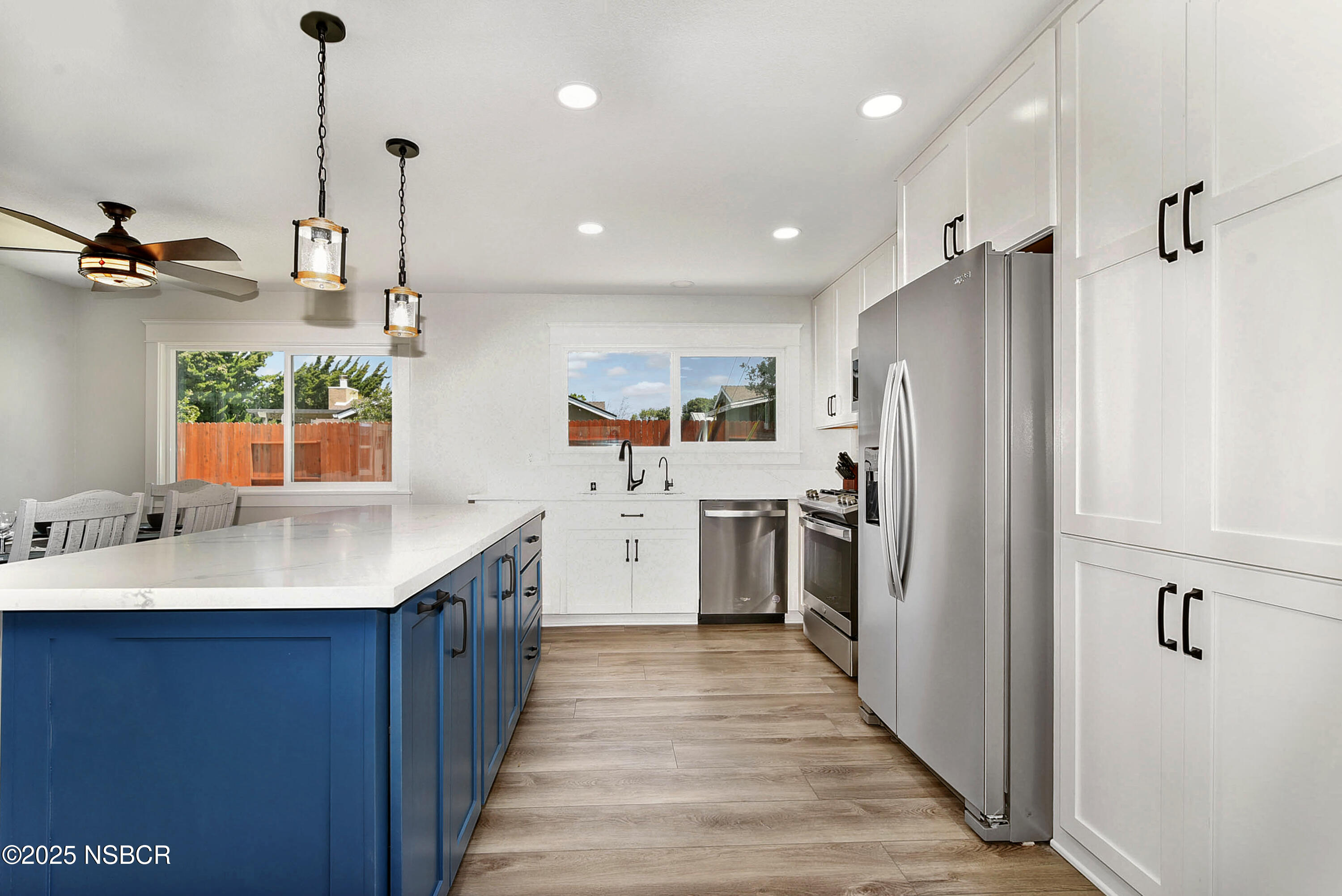 1133 Alden Avenue Lompoc, CA 93436 - Photo 11 of 27 a kitchen with stainless steel appliances a sink stove and refrigerator
