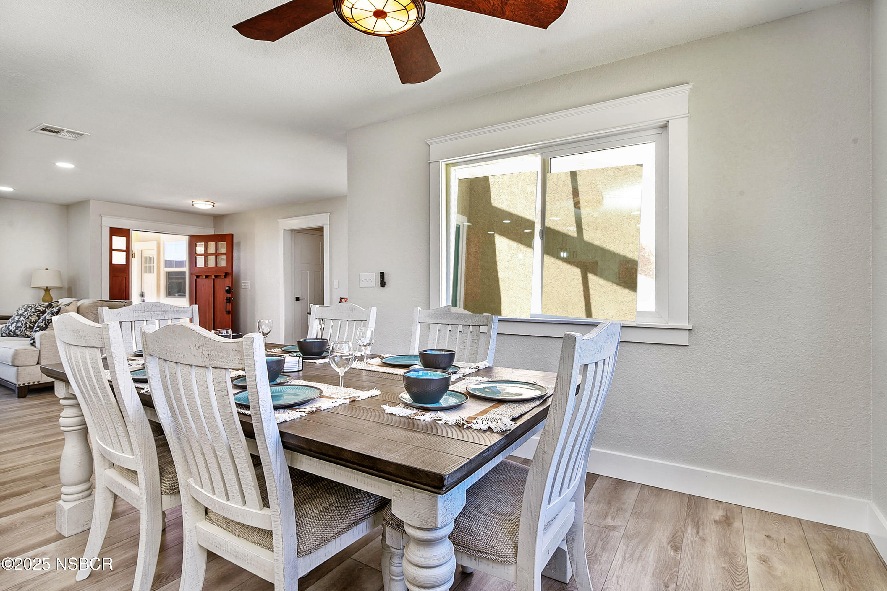 1133 Alden Avenue Lompoc, CA 93436 - Photo 14 of 27 a view of a dining room with furniture and chandelier
