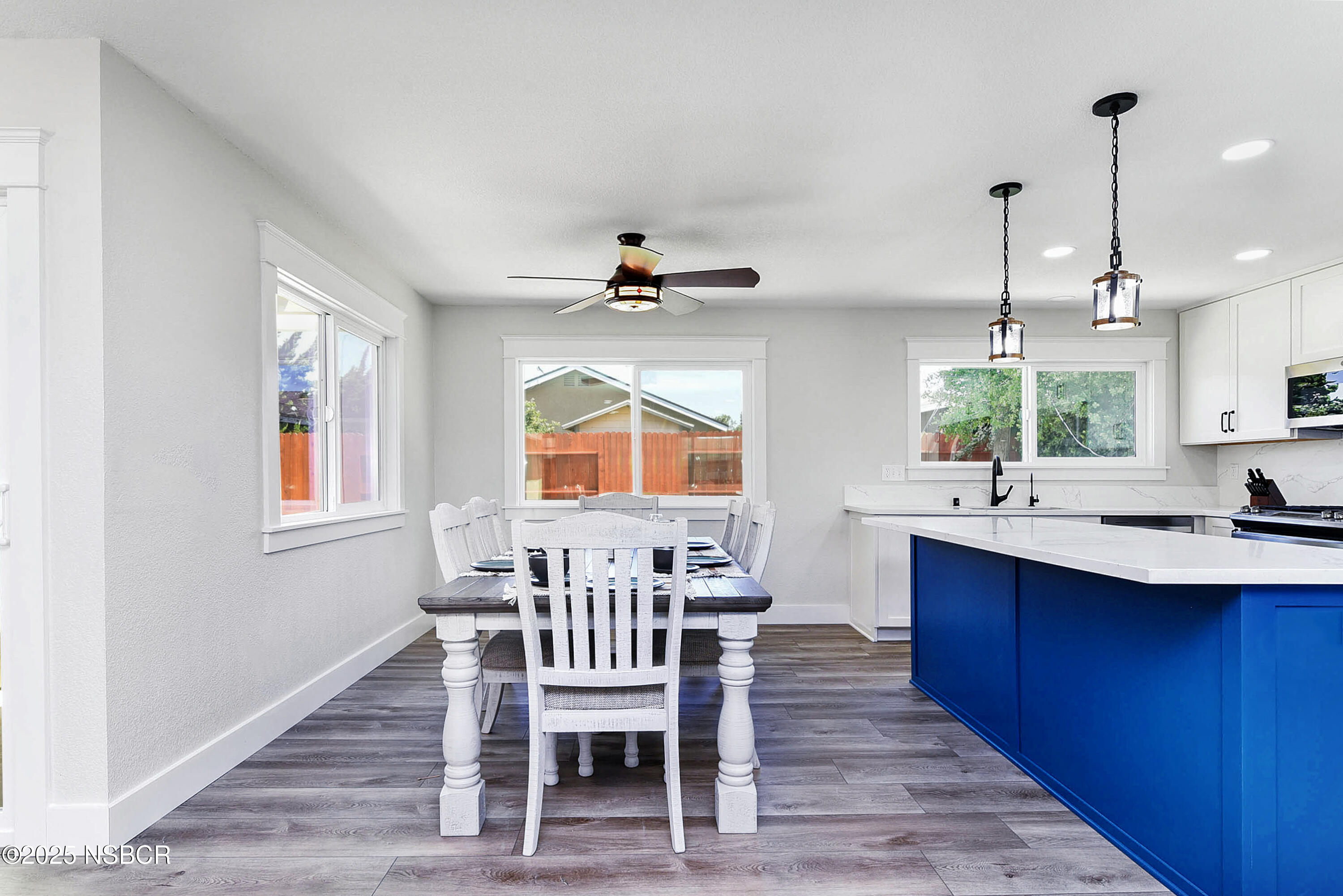 1133 Alden Avenue Lompoc, CA 93436 - Photo 15 of 27 a kitchen with stainless steel appliances granite countertop a sink stove and wooden floor